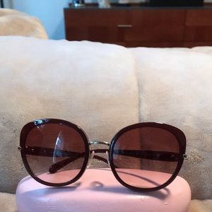 Prada woman sunglasses round cat eye burgundy